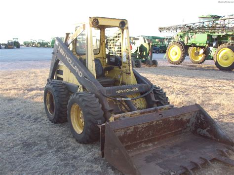 555 newholloned skid steer spec|new holland skid steer reviews.